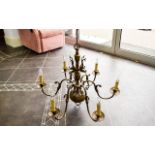 A Vintage Six Branch Metal Chandelier Electric ceiling fitting in aged pewter tone with six ornate