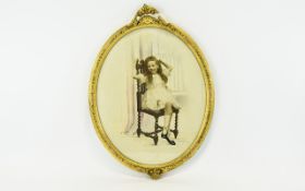 A Framed Sepia Tone And Hand Tinted Portrait Of A Young Girl Housed in oval gilt frame , depicts a