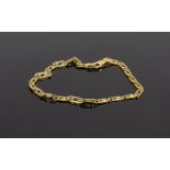 18 Carat Yellow Gold Bracelet marked 750. Paper clip design 7 inches in length 3.7 grams.