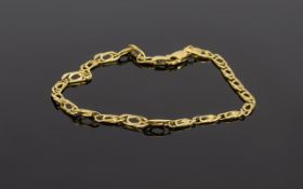 18 Carat Yellow Gold Bracelet marked 750. Paper clip design 7 inches in length 3.7 grams.