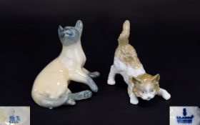 Royal Copenhagen Porcelain Siamese Cat Figure Model no. 2862 by Theodor Madson, date, 1962. Plus a