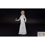 Nao Figure, young girl with chamber stick and lit candle. 10.5 Inches high ( a/f ) Small chip to Tip