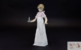 Nao Figure, young girl with chamber stick and lit candle. 10.5 Inches high ( a/f ) Small chip to Tip