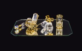 Swarovski Minatures Collection Comprising of, Rocking Chair, Bells, Hourglass & Magnifying Glass all