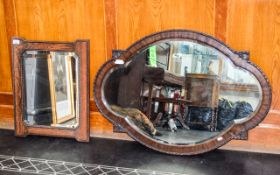 Beveled Glass Mirror Antique mirror in dark wood frame with beaded inner banding and carved detail