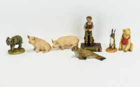 A Collection of 7 Porcelain Animals and Oliver Twist. Includes Two Separate Pigs,'Aynsley Piggy' A