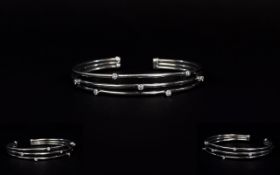 18ct White Gold 3 Strand Bangle Set with Diamonds ( 7 ) Seven In Total. All Brilliant Cut of Good