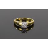 18 Carat Yellow Gold Set Single Stone Diamond Ring The central round diamond of 50pts - 1/2ct