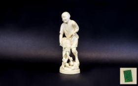 Japanese 19th Century Well Carved Ivory/Okimono Figure In the form of a fisherman, signed to