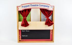 Children's Finger Puppet Theatre Of wooden construct with large aperture to front with red