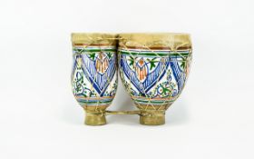A Set of Decorative Drums, Fashioned from glazed earthenware with hand painted blue, green and umber