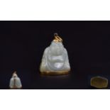 Antique Period Jade Figural Pendant In The Form of Buddha Set In Hight Ct Gold Mounts. Wonderful