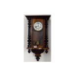 Vienna Wall Clock typical form, spring driven movement with pendulum. Mahogany veneered case, Height