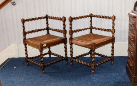 Pair of Victorian Barley Twist Corner Chairs with rush seats. 27 inches high. The seat measures 17