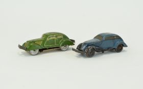 Vintage Tin Cars A pair of tin plate cars in, circa 1930's. The first in cadet blue with tin bumpers
