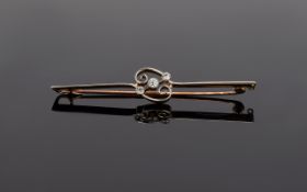 Ladies 15 Carat Gold and Platinum Bar Brooch. set to centre 3 old cut pavee set diamonds not