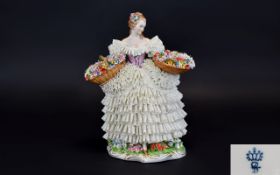 Dresden Sitzendorf Flower Seller Figurine With Intricate Lace Dress A fine, late nineteenth