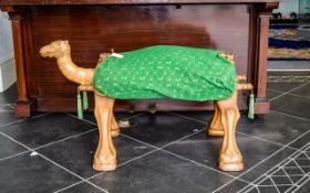 Vintage Hand Carved Camel Stool Unusual carved blonde wood stool in the form of a camel with two