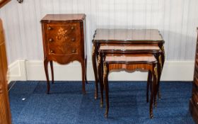 Nest of Three Walnut French Style Tables, with ormolu mounts and floral inlay. Height 23 inches,