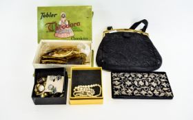 A Varied Collection Of Vintage Hair Combs, Bags And Costume Jewellery A collection of 12 faux