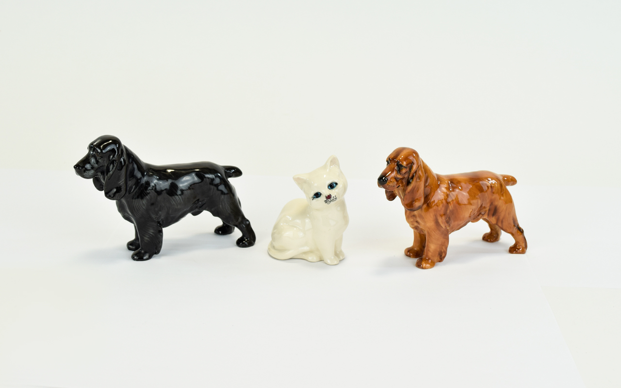 A Collection Of Royal Doulton Animal Figures Three in total to include, Cocker Spaniel - chestnut