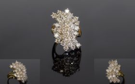 A Large and Impressive 14ct Gold Diamond Cluster Ring,