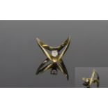 9Ct Gold Wishbone Shaped Ring with central round cut diamond set the diamond is of good colour and