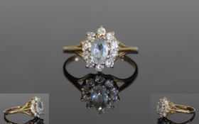 9ct Gold Dress Ring, Set With A Central Blue Stone Surrounded By Round CZ's, Fully Hallmarked.