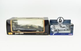 Two Collectable Cars.One Skyfall 007 Silver Ashton Martin D135. Scale 1:36. Made of DieCast Metal.