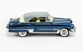 Franklin Mint Model Car 1949 Cadillac Coup De Ville Finished in metallic storm blue with grey roof