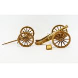 A Handmade Miniature French Cannon An intricate reproduction wood and brass model cannon, based on