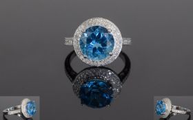 14ct White Gold Blue Topaz & Diamond Rin