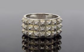 Victorian Period Solid Silver Hinged Bangle with Raised Pyramid Design to Front Section.