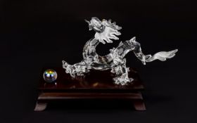 Swarovski Crystal Zodiacs Figure 'Fables and Tales' Dragon and Crystal Ball with wooden stand,