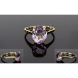 Ladies 9ct Gold Single Stone Amethyst Set Dress Ring. The Amethyst of About 3 cts.