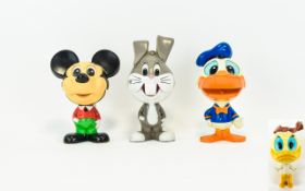 Collection of Vintage - Disney Pull-up Plastic Toys & 1 Looney Tunes ( 4 ) Altogether.