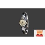 Cyma - Swiss 9ct White Gold Ladies Dress Watch with Diamond Set Corners to Bezel and Shoulder and