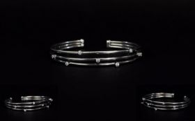 18ct White Gold 3 Strand Bangle Set with Diamonds ( 7 ) Seven In Total.