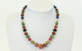 A Vintage Semi Precious Multi Stone Necklace Short collar length necklace strung with multiple semi