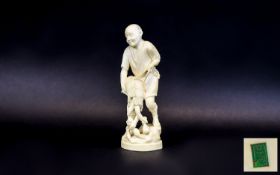 Japanese 19th Century Well Carved Ivory/Okimono Figure In the form of a fisherman,