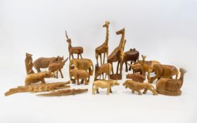 Collection of Wooden Animal Figures including elephants, giraffe, rhinoceros, crocodile, monkey,