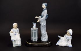 A Collection Of Cascade Ceramic Figures Three in total to include large geisha figure on black