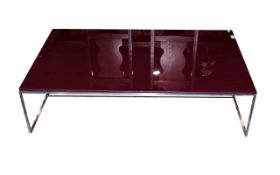 Italian Style Chrome Framed Low Coffee Table with red glass top. 12 inches high 28 by 47 inches.