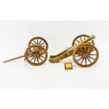 A Handmade Miniature French Cannon An intricate reproduction wood and brass model cannon,