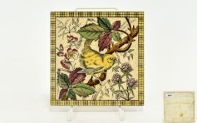 Decorative Tile Late 19th/early 20th century transfer printed earthenware tile with yellow finch,