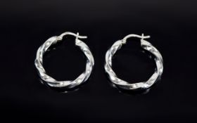 Ladies 9ct White Gold Pair of Hoop Earrings. In As New Condition and Fully Hallmarked for 9ct Gold.