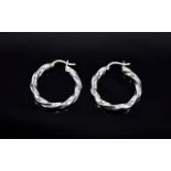 Ladies 9ct White Gold Pair of Hoop Earrings. In As New Condition and Fully Hallmarked for 9ct Gold.