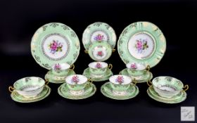 A Large Fine Bone China Dinner Service By Southern China Eighty four items in total to include,