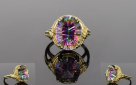 Ladies - 9ct Gold Mystic Topaz Set Dress Ring. Mystic Topaz Oval Shaped with Faceted Rainbow Colour.