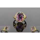 Ladies - 9ct Gold Mystic Topaz Set Dress Ring. Mystic Topaz Oval Shaped with Faceted Rainbow Colour.